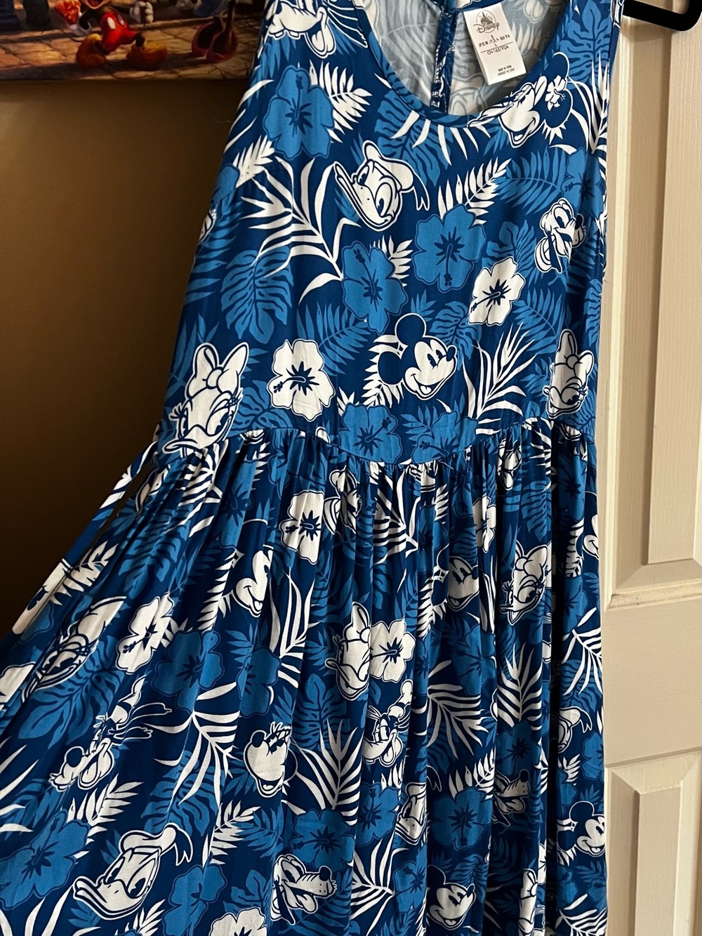 Women's Disney Hawaiian print and characters with pockets.